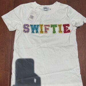 White Kids Shirt with Colorful Sequin Letters “swifty”